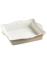 This pristine white serveware features a gently scalloped rim and raised pattern of cascading vines. Perfect for casual dining or formal entertaining, this charming baker is sure to enhance mealtime at your home. Can go from freezer to oven! From Lenox's dinnerware and dishes collection.