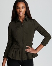 Update your outerwear with this flattering Burberry London jacket sporting a peplum waist for feminine flair.