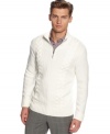 Traditional detailing in a fine knit creation. Calvin Klein's classic cable sweater redefines debonair style.