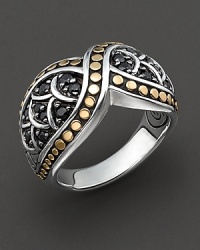 John Hardy's dragon-inspired Naga line adds this elegant ring to the mix. Its sweeping cross-over pattern is adorned with gold studs and silver scale overlays over clusters of black sapphire. Designed by John Hardy.