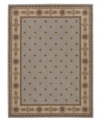 Elegant and refined, this distinctive collection is speckled with blossoms and bordered with vines in an understate palette of warm, neutral tones. Bearing the rich patina of premium-quality Opulon¿ yarns, each rug boasts a densely woven and strikingly luxurious pile that's a pleasure to touch and admire. One-year warranty.