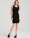 This little black dress from DKNY exudes class and poise, day or night. Dress up with jewelry and peep-toe pumps or keep the look simple for elegant workdays.