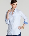 The classic Isaac Mizrahi boyfriend shirt gets a feminine reboot with slim tailoring and contrast cuffs.