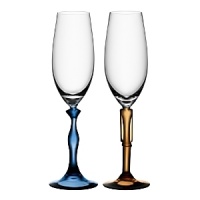 The Two Of Us champagne glasses are a tribute to everlasting love and the joy of finding that person who will always stand by you. Designed by Kjell Engman for Kosta Boda.