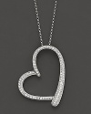 Diamonds gleam from a 14K white gold heart pendant.