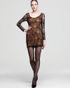 A party-poised dress that commands the spotlight with alluring lace sleeves, this KAS New York look is sheer perfection.