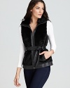 Zip up in this ultra-plush GUESS vest for incredible warmth and a super-chic alternative to a jacket.