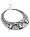 Stop people in their tracks with Ali Khan's ultra-chic collar necklace. With crystal clear lucite stones on a crescent moon silhouette, you'll be the focus of attention. Crafted in antiqued silver tone mixed metal. Approximate length: 10-1/2 inches + 3-inch extender. Approximate drop: 1-7/8 inches. Approximate diameter: 5-1/4 inches.