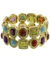 Stones of all colors. 2028's gold tone stretch bracelet features the brightest, most colorful acrylic stones you'll see all season. Approximate length: 7 inches. Approximate diameter: 2-1/2 inches.