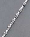 Utterly unique. Links of cylindrical platinum over sterling silver separate gleaming round-cut cubic zirconia (2-1/10 ct. t.w.) in this stunning CRISLU bracelet. Approximate length: 7-1/2 inches.