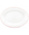 Distinctly ribbed Sophie Conran dinnerware sets your table with the charm of traditional hand-thrown pottery, but the durability of contemporary Portmeirion porcelain. Mix the banded Carnivale platter with solid pink pieces.