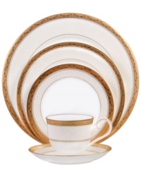 Noritake makes any occasion memorable with the opulent grace of Odessa Gold dinnerware. Wide bands of etched gold and pale gray with delicate blooms adorn this classic bone china place setting.