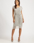 Uniquely chic, this silk sheath features a snakeskin-print overlay and a waist-defining self-tie belt for an enviable silhouette.Round neckShort sleevesSelf-tie beltCord endsAbout 36 from shoulder to hemSilk; overlay: 96% modal/4% elastane Dry cleanImported Model shown is 5'10 (177cm) wearing US size 4. 