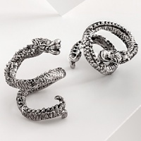 The grand form of a mythical dragon was the muse behind this sculptural hand-cast napkin ring from Natori.