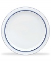 Named for a trendy Copenhagen neighborhood but designed with timeless style, the Christianshavn Blue serving platter features a double band of navy in pristine white porcelain. From Dansk.