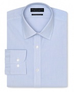 Dress shirt with spread collar, two button barrel cuffs and a contemporary fit through the body, with an allover blue stripe pattern.