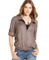 An elastic hem and roll tab sleeves bring irresistible style to a casual, every day jacket! From American Rag.