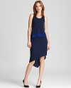 Asymmetrical, streamlined and slinky, this BCBGMAXAZRIA dress has all the makings of youthful, modern elegance.