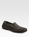 Sporty suede slip-on with stitch detail and an embossed logo.Suede upperRubber soleImported