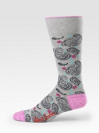 Elegant, finely woven dress socks with a paisley pattern and bright color at the toe and heel. Mid-calf height 80% cotton/19% nylon/1% Lycra Machine wash Imported 