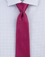 Tonal dots adorn this tie of rich Italian silk, perfect for every gentleman. SilkDry cleanItaly