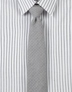 Slightly textured pindot tie adds finishing touches to any modern dress wardrobe.57% cotton/43% silkDry cleanMade in USA