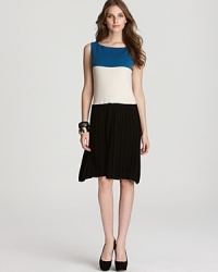 Approach the color block trend with refined sophistication in this Rachel Roy dress, flaunting a pleated skirt for a classic, feminine silhouette.