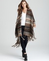 Cozy up to this made-for-fall Michael Stars wrap, crafted from an ultra-soft wool blend with a chic fringed hem, and inspired by the natural beauty of Santa Fe.