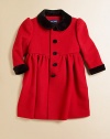 Sure to be a treasured heirloom, an exquisite princess coat is crafted from a luxuriously soft blend of wool and cashmere then finished with a velvet collar and cuffs.Rounded velvet collarLong puffed sleeves with velvet cuffsButton-frontGathered empire waist with back buttonFully linedWool/CashmereMachine washImported