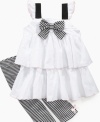 Getting her ready is as simple as black and white with this bold ruffle dress and legging set from Kids Headquarters.