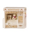 An essential part of holiday preparedness, the newstand is where Mistletoe Park residents go to read up on holiday decor, get ideas for a gourmet Christmas and buy milk for Santa's cookies. With incredible gold detail and trim in ivory porcelain.