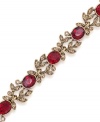 Paint the town red in this flex bracelet from Carolee. Crafted from gold-tone mixed metal, the bracelet has red beads that give it a sensational pop of color. Approximate length: 7-1/2 inches.