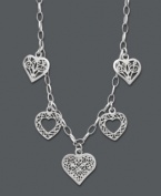 This Giani Bernini style is certain to capture your heart. For the free-spirited fashionista, five filigree hearts create an enchanting look you'll cherish forever. Crafted in sterling silver. Approximate length: 16 inches.