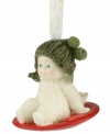 Come on, it's lovely weather! Crafted of pure bisque porcelain, this precious ornament is hand-painted and continues the Snowbabies tradition of lasting childhood innocence and joy. Fine knitted detailing enhances its lovable charm.