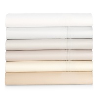 From 500-thread count sateen woven of the finest pima cotton, this Barbara Barry king flat sheet is adorned with a crisp triple pleat at the cuff. In a new array of modern colors, Pintuck Sateen lends luminous elegance to your bedding repertoire.