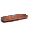 Perfect for serving a satisfying main dish or a combination of hors d'oeuvres, this long rectangular platter tackles it with smart taste. Noritake refines the rustic appeal of wooden serveware with the beautifully smooth, medium brown Kona Wood collection.