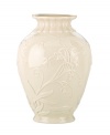 Lenox combines ivory porcelain sculpted with graceful blooms, elegant fluting and touches of gold in the classically styled Floral Melody vase.