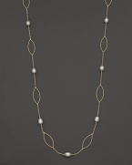 Freshwater pearls add rich luster to links of 14K yellow gold. By Nancy B.