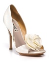 Elegant d'orsay evening pumps with a delicate floral appliqué at an open toe. A perfect shoe for your next wedding or cocktail party.