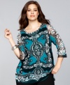 Go long with INC's plus size tunic. Shimmering sequins add sparkle to an appealing, exotic-print top.