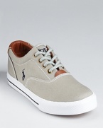 The classic preppy low-top rendered in canvas with leather lining and trim.