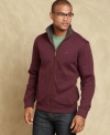 Casual can still be classy with this handsome and comfortable sweater from Tommy Hilfiger.