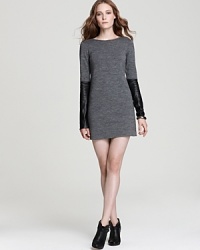 Exude modern edge in this 10 Crosby Derek Lam sweater dress boasting leather sleeves for downtown cool with uptown appeal.