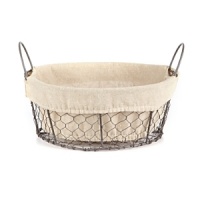 Carry on! This rustic basket is the perfect way to stylish store your belongings in plain sight.