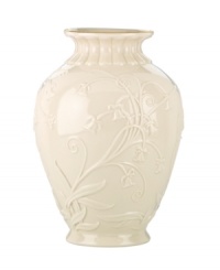 Lenox combines ivory porcelain sculpted with graceful blooms, elegant fluting and touches of gold in the classically styled Floral Melody vase.