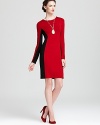 Karen Kane's sleek sheath dress flatters your figure with a clever color panel design.