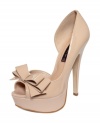 Sleek and cute. STEVEN by Steve Madden's Ariall platform pumps feature a big beautiful bow across the vamp.