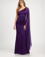 Luxurious silk in an asymmetrical silhouette, accented with a single floor-length chiffon sleeve and a jeweled shoulder detail.Asymmetrical necklineBeaded shoulder detailSingle long chiffon sleeve with floor-length drapeConcealed back zipSilk liningAbout 45 from natural waistSilkDry cleanImportedModel shown is 5'10 (177cm) wearing US size 4. 