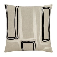 This linen pillow has guided embroidery in earth tones that adds some playful style to your home.