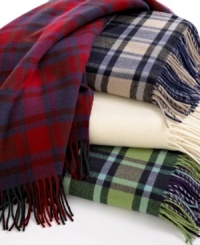 Classic comfort. Wrap yourself in the pure luxury and warmth of this throw from Pendleton, featuring plush wool fabric and your choice of either plaid or solid colors.